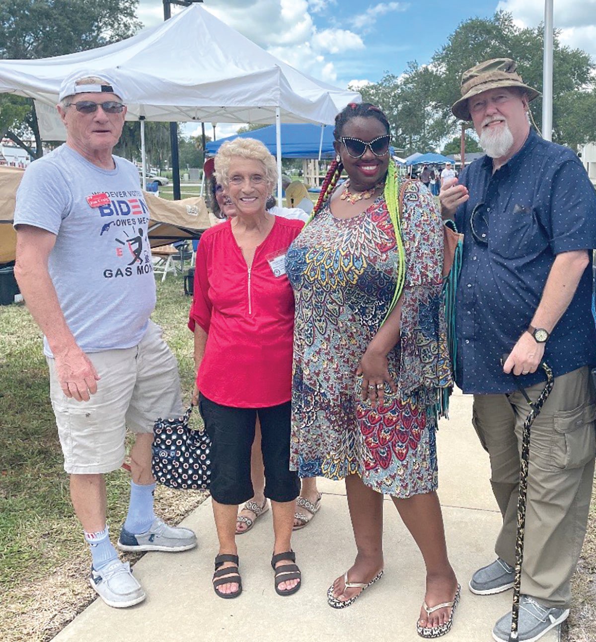 Club President Alicia LaChance with friends and volunteer Raymond Brooks (right).